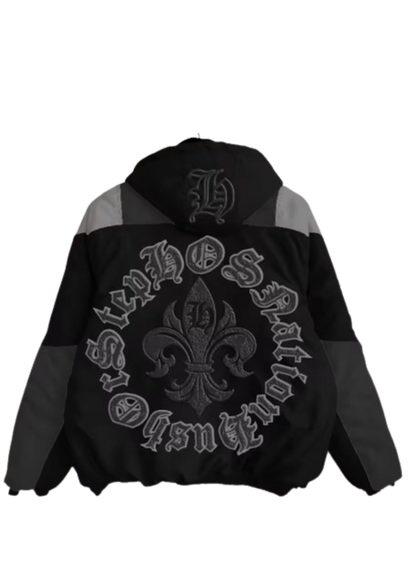 Black jacket with gray accents and embroidered designs on a white background