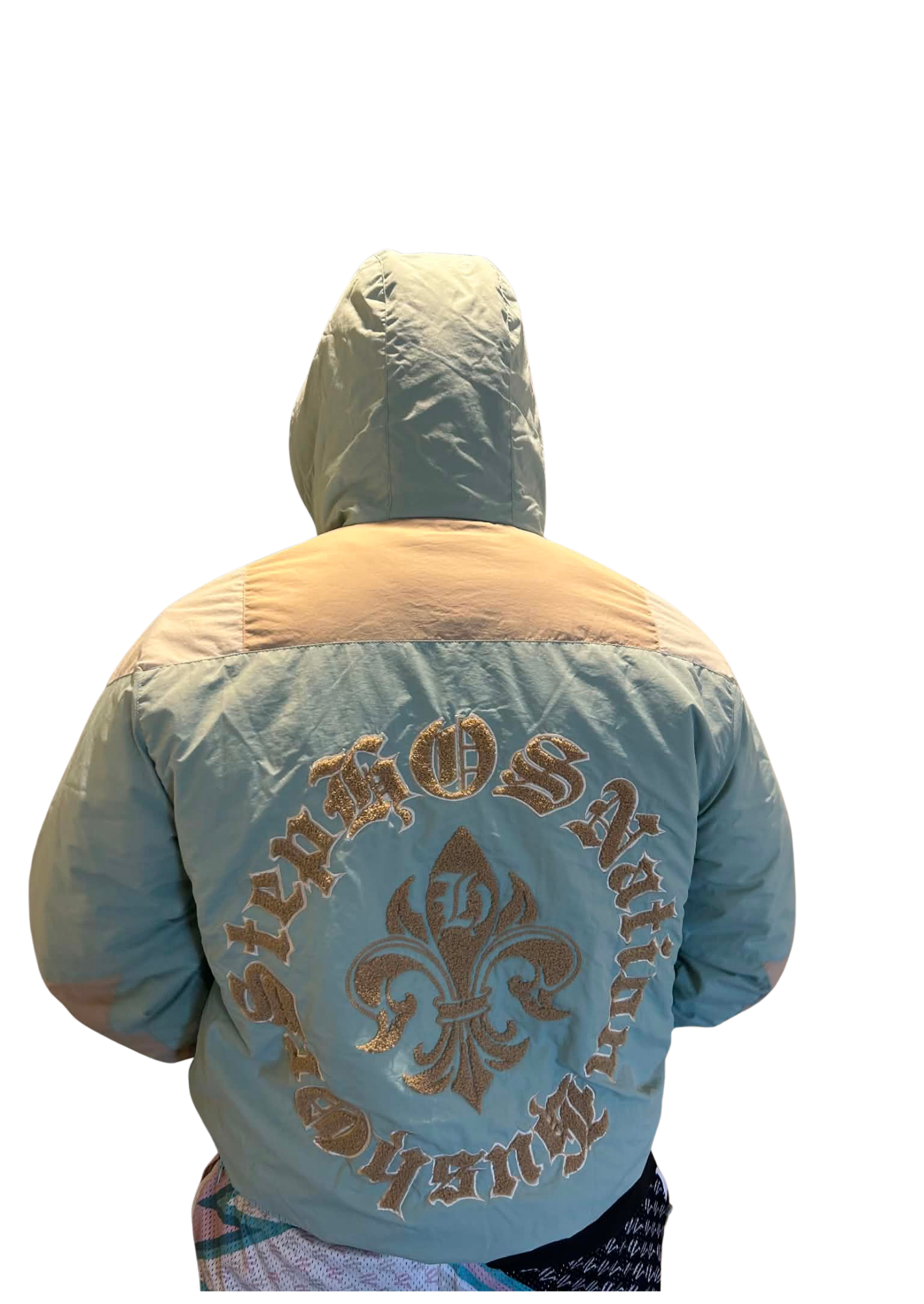 Light blue jacket with 'Hush or Step Nation' logo on the back, worn by a person against a white background.